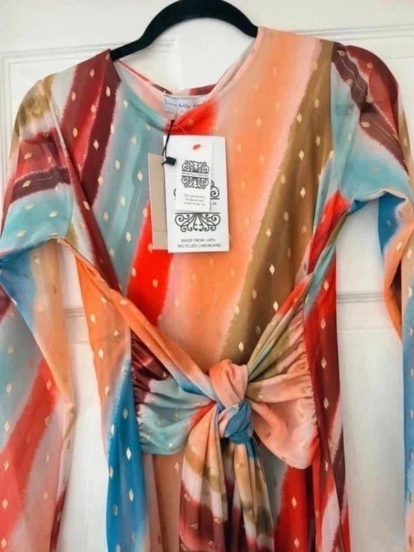 Never Fully Dressed Never fully dressed wedding guest  multi coloured orange browns dress long sleeves holiday size 8-10