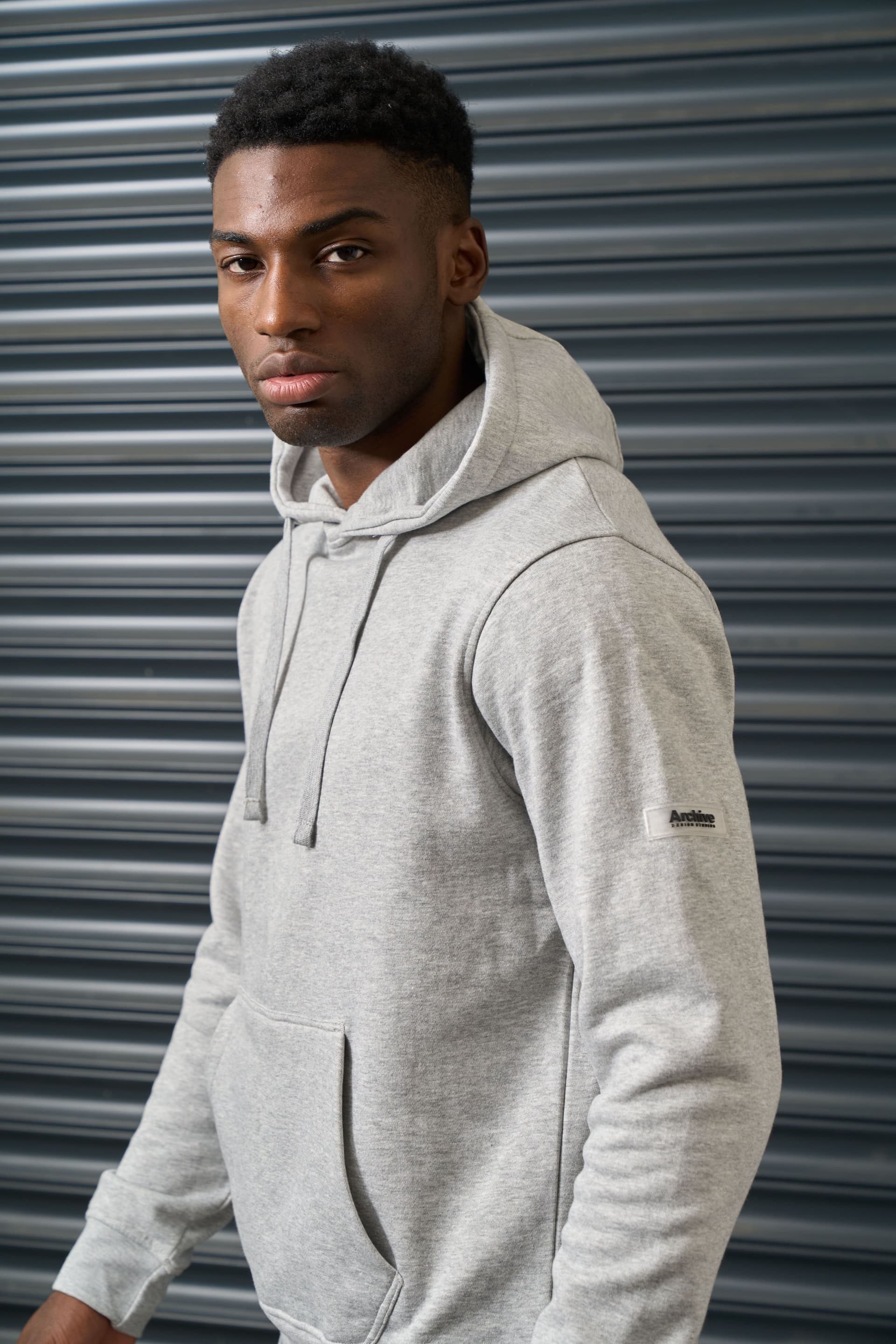 Archive Design Studios Archive Design Studios Archive Men's Joro Hoodie - Brushed Back Fleece with Rubber Sleeve Badge in Grey
