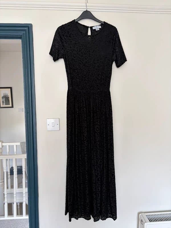 Never Fully Dressed Never Fully Dressed. Black midi dress. Velvet animal print. Fully lined.