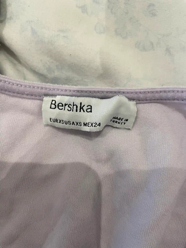 Bershka Bershka lilac wrap around long sleeve velvet top. Size UK6