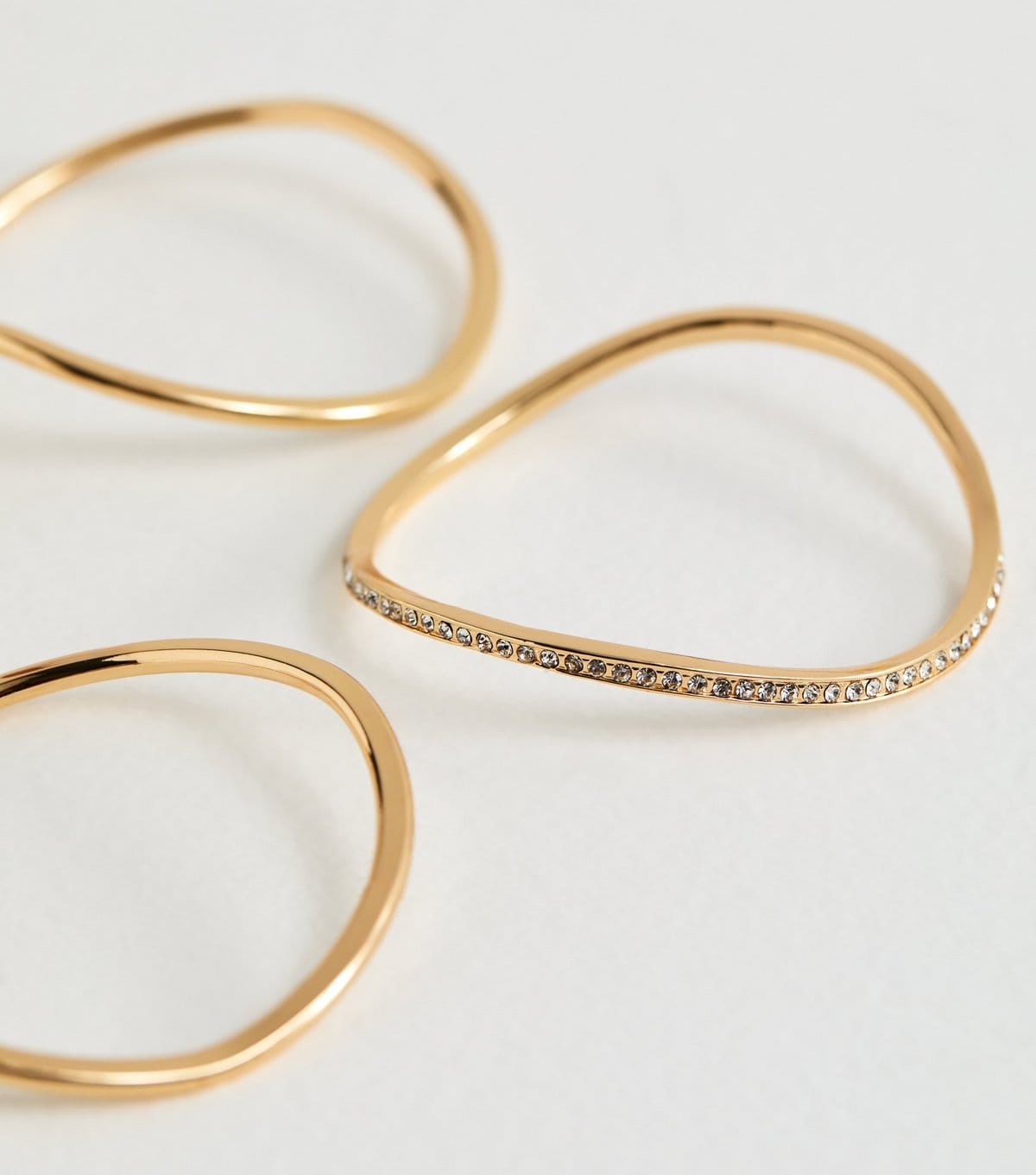 New Look Pack of 4 Gold Tone Diamante Curve Bangles New Look - 4