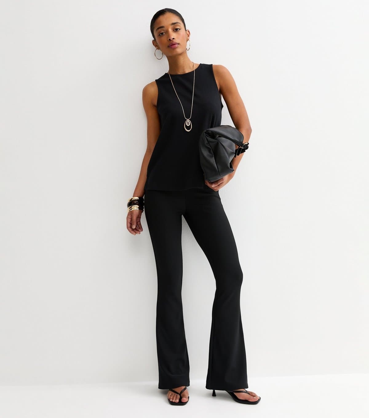 New Look Women's Black Ribbed Flared Trousers New Look