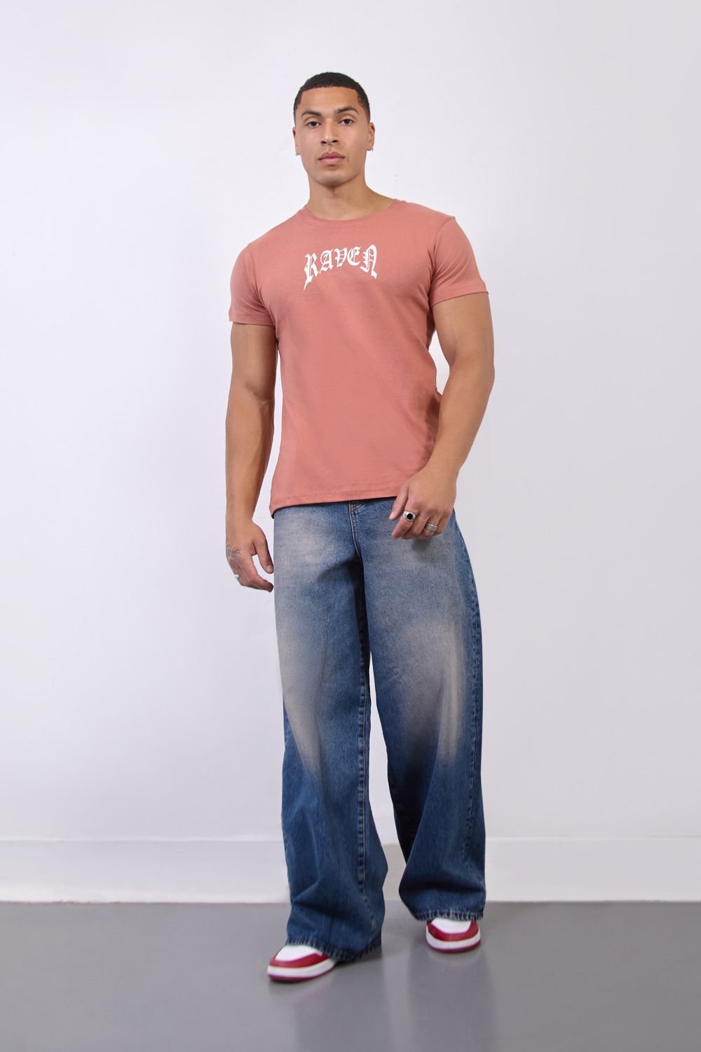 LONDON ATTITUDE LONDON ATTITUDE Men's Raven Graphic T-Shirt in Rust in Peach - 4