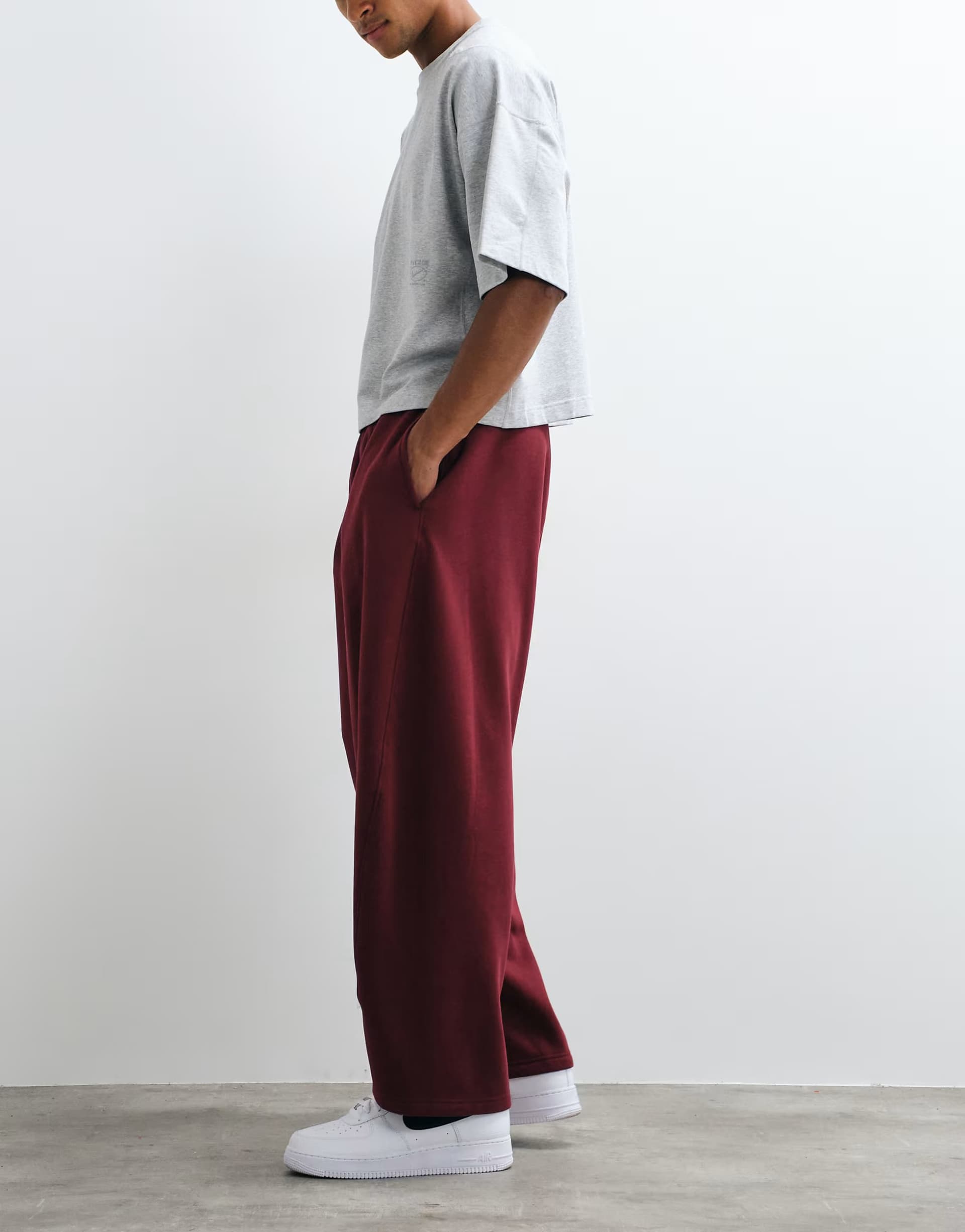 ASOS Weekday wide barrel leg pleated joggers in burgundy
