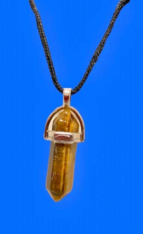 Crystal Tiger’s eye crystal point pendant on necklace