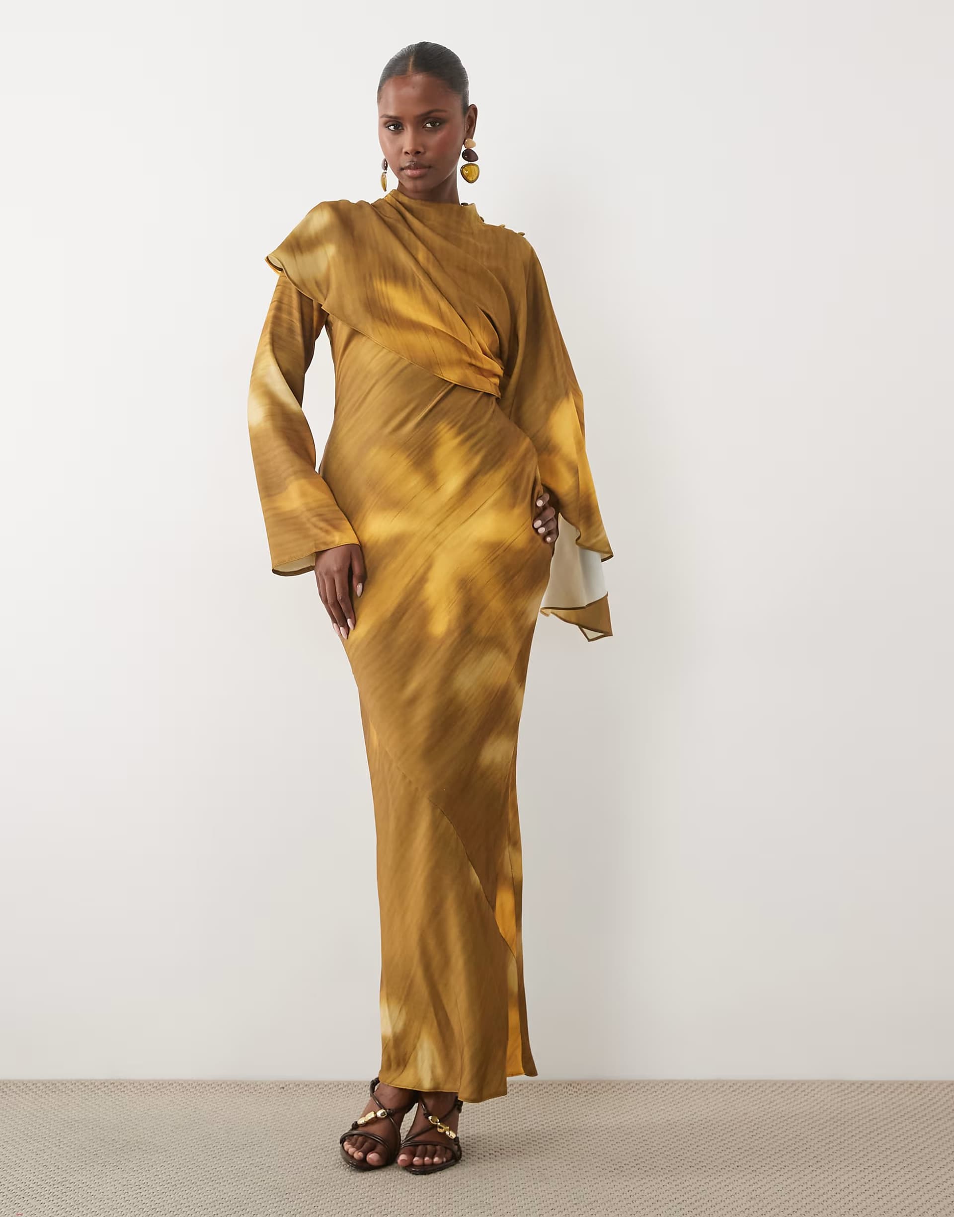 ASOS ASOS DESIGN asymmetric cape detail maxi dress with gathered waist in ochre & brown blurred floral print