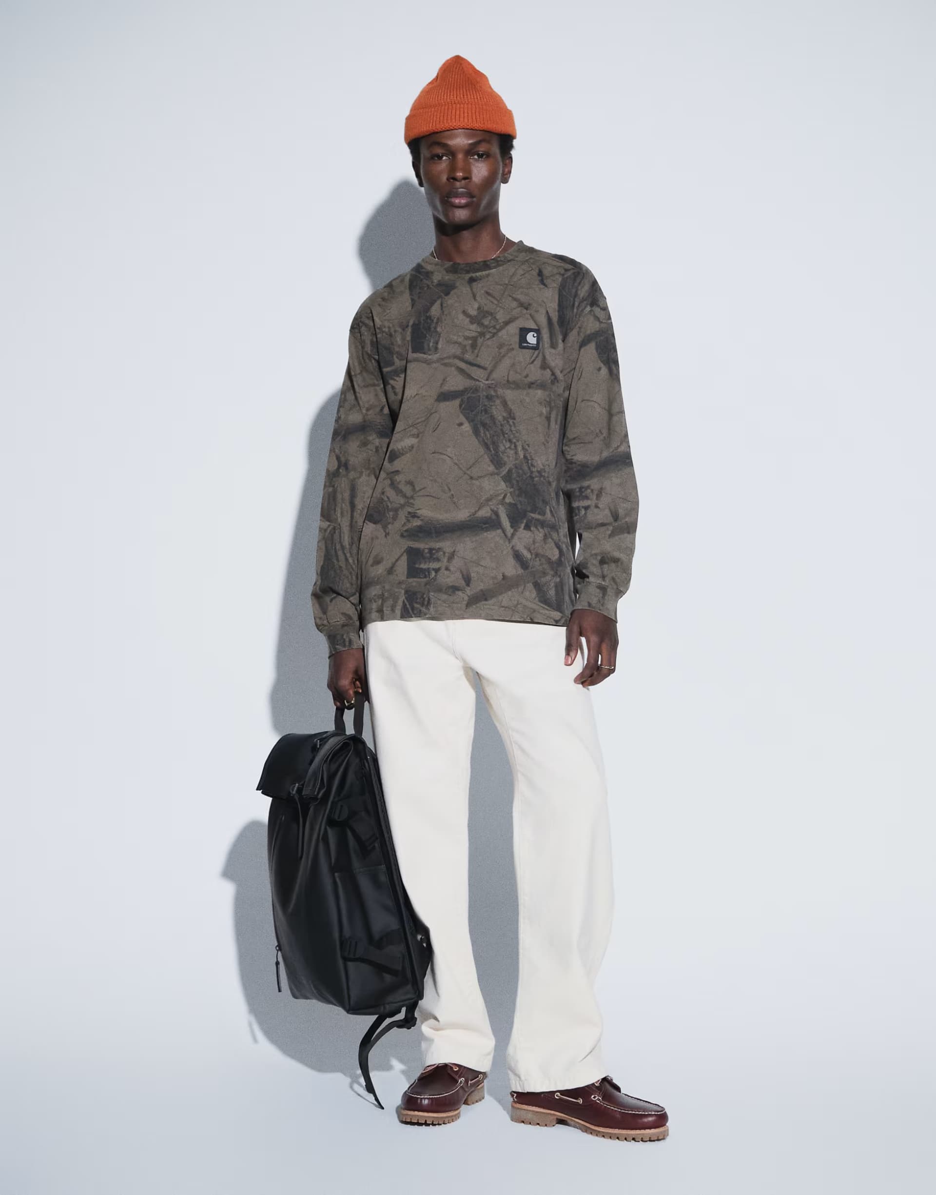 ASOS Carhartt WIP Landon loose-tapered fit trousers in natural