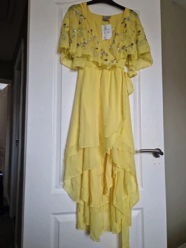 ASOS Asos dipped hem embellished dress. Wrap style