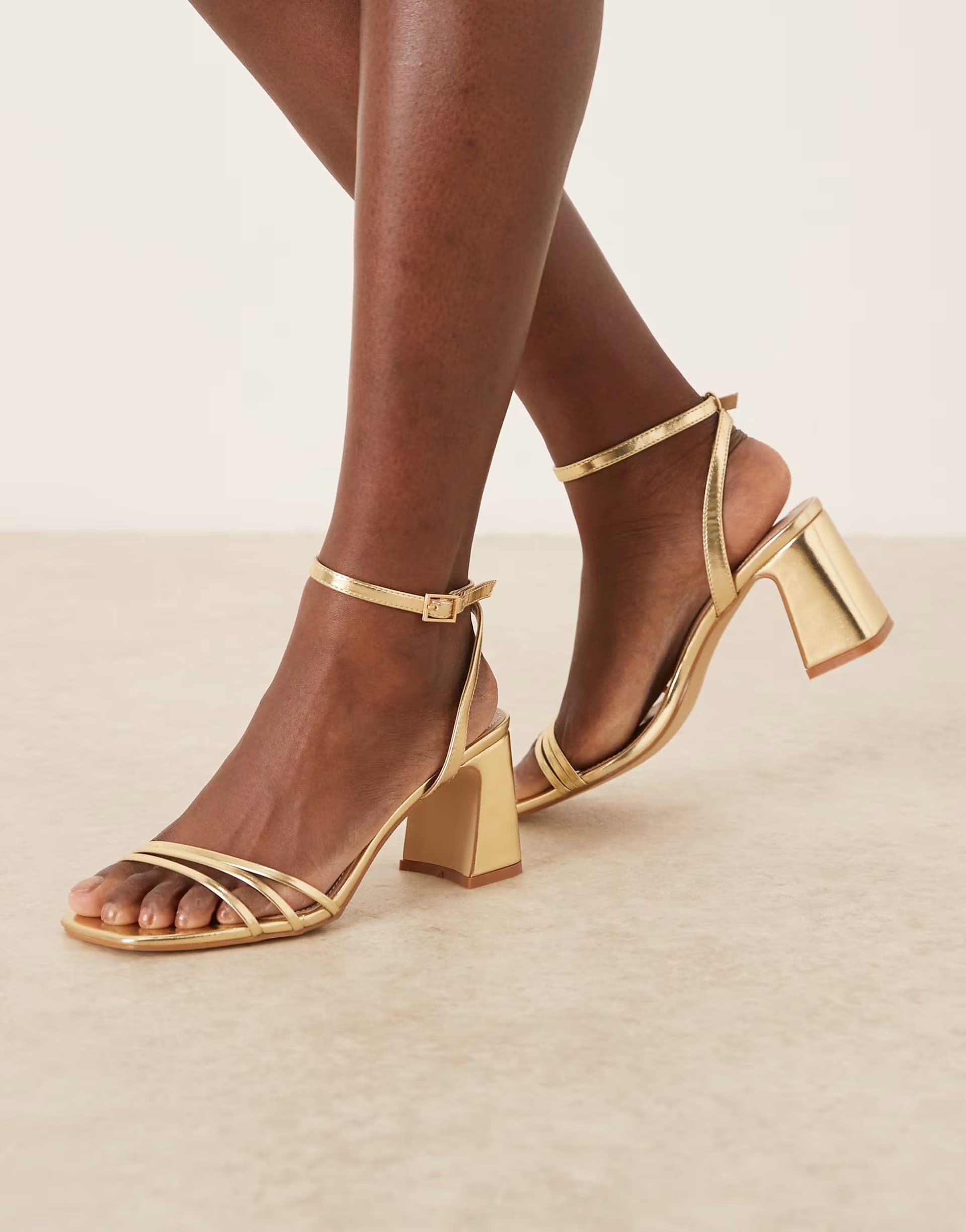 ASOS RAID Wide Fit Kittey block heeled sandals in gold