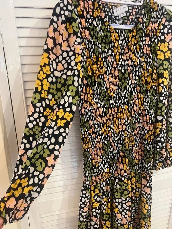 Never Fully Dressed Never Fully Dressed smocked floral print midi dress.