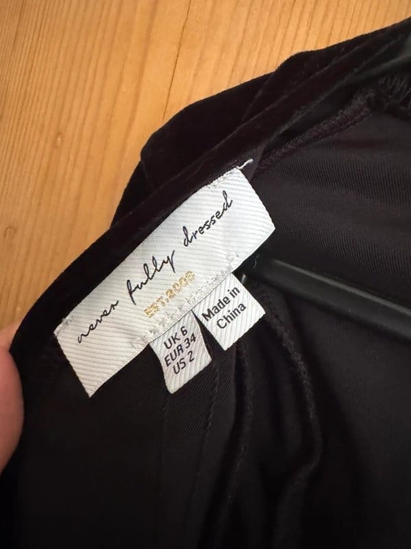 Never Fully Dressed Black Velvet Backless Dress with Bow