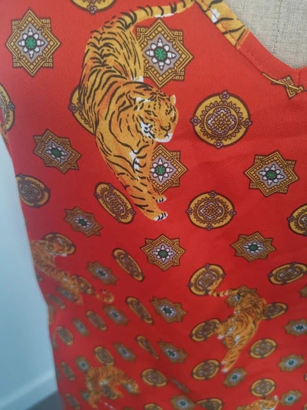 Never Fully Dressed Never fully dressed, pretty summer cami top. Orange/tiger.size 10