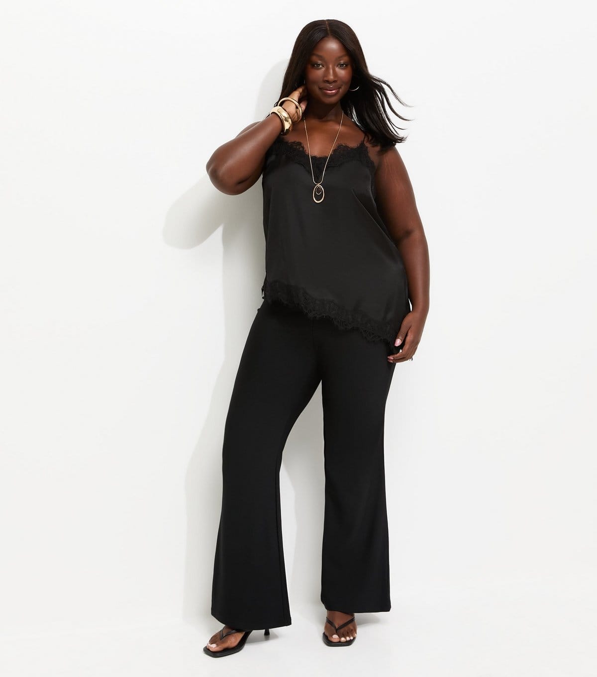 New Look Plus Size Black Ribbed Flare Trousers for Curves