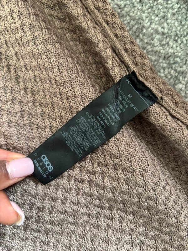 ASOS Asos men’s turtleneck sweater in a textured woven pattern.