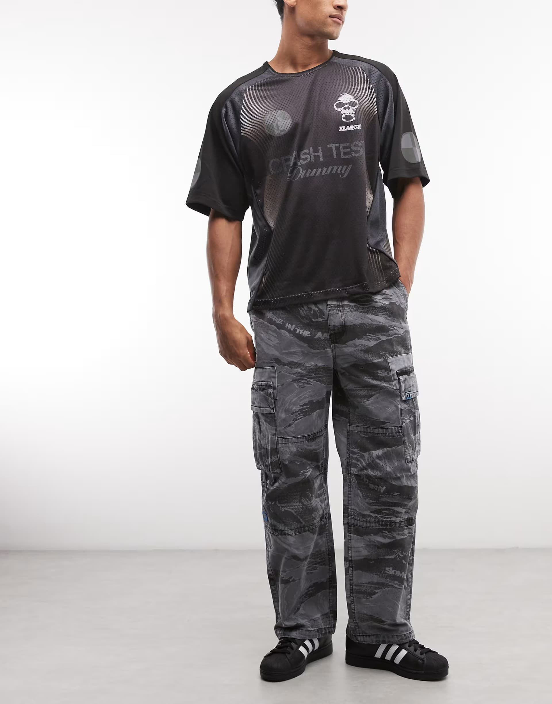 ASOS Aape by A Bathing Ape loose fit cargo trousers in black camo