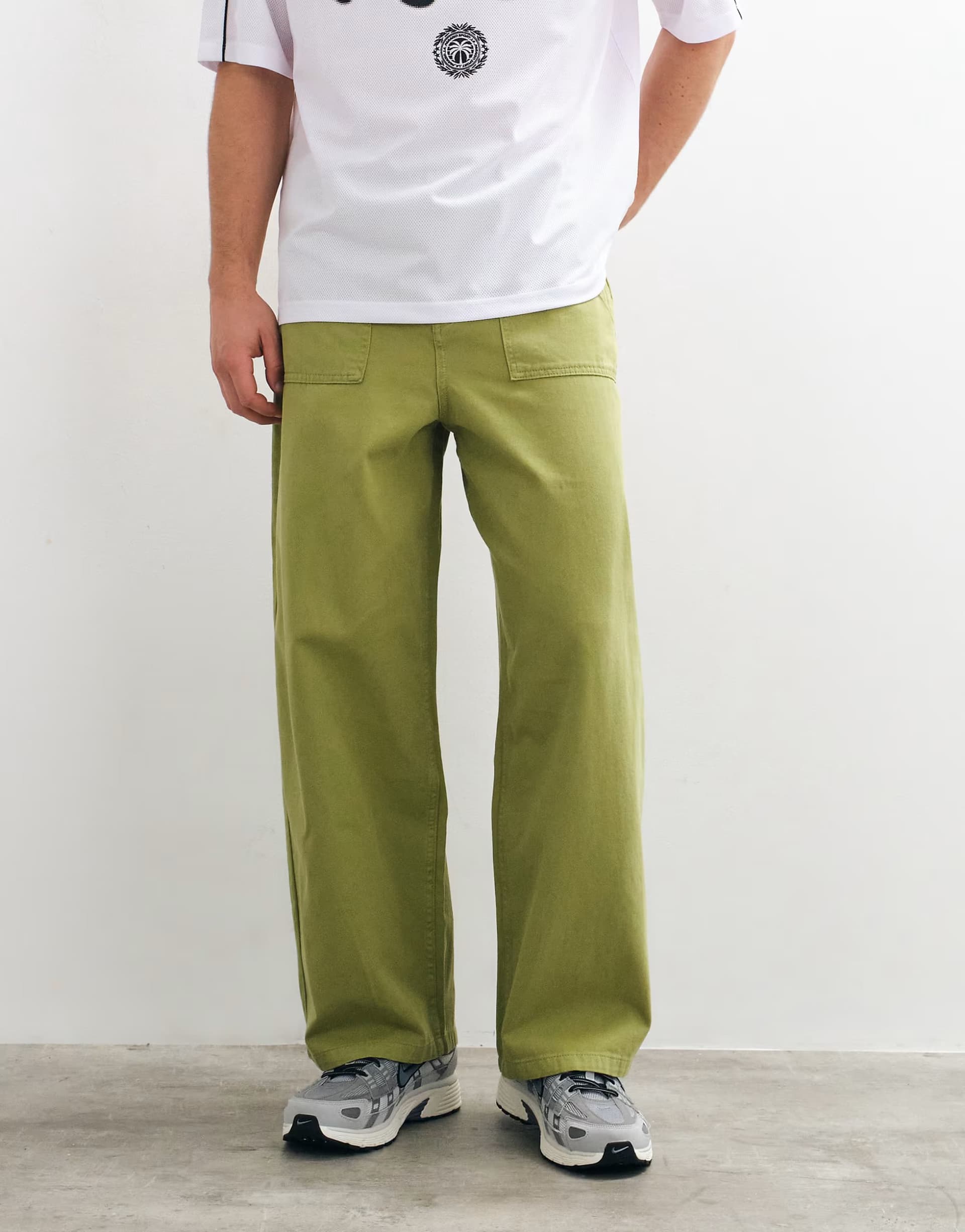 ASOS ASOS DESIGN barrel trousers in olive with fatigue pockets