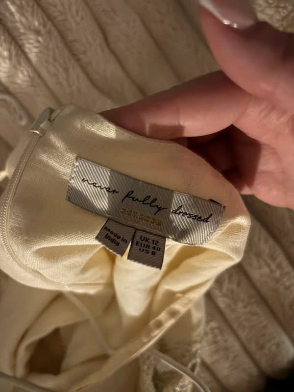 Never Fully Dressed Never fully dressed embellished dress