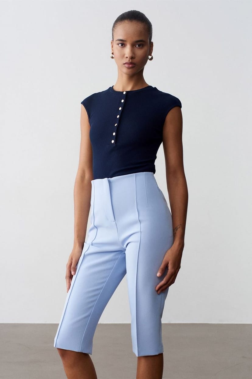 Dilvin Dilvin Women's High-waist Straight Capri Shorts With Slit in Baby Blue - 1