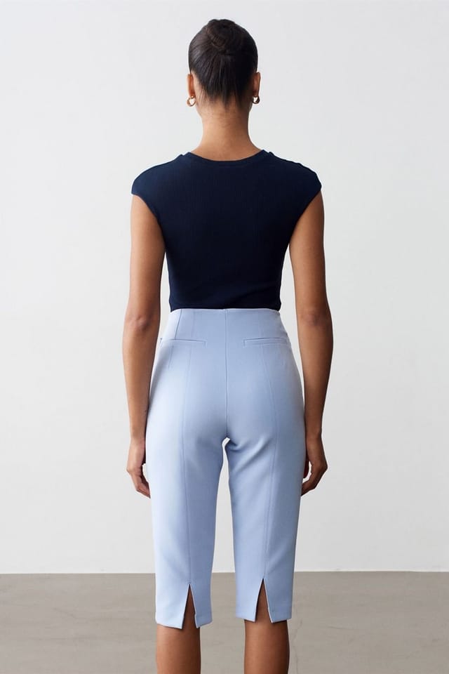 Dilvin Dilvin Women's High-waist Straight Capri Shorts With Slit in Baby Blue - 3