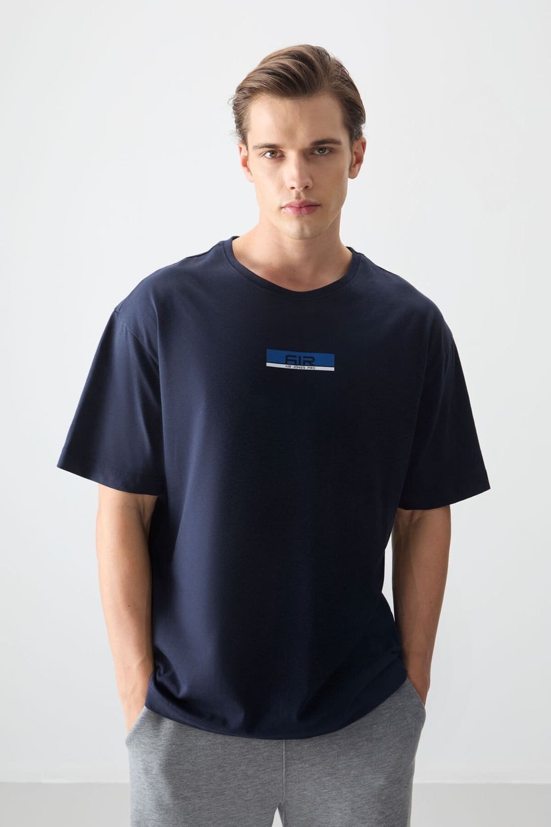 Tommy Life Tommy Life Men's Oversized Cotton Logo Patch T-Shirt in Navy - 1