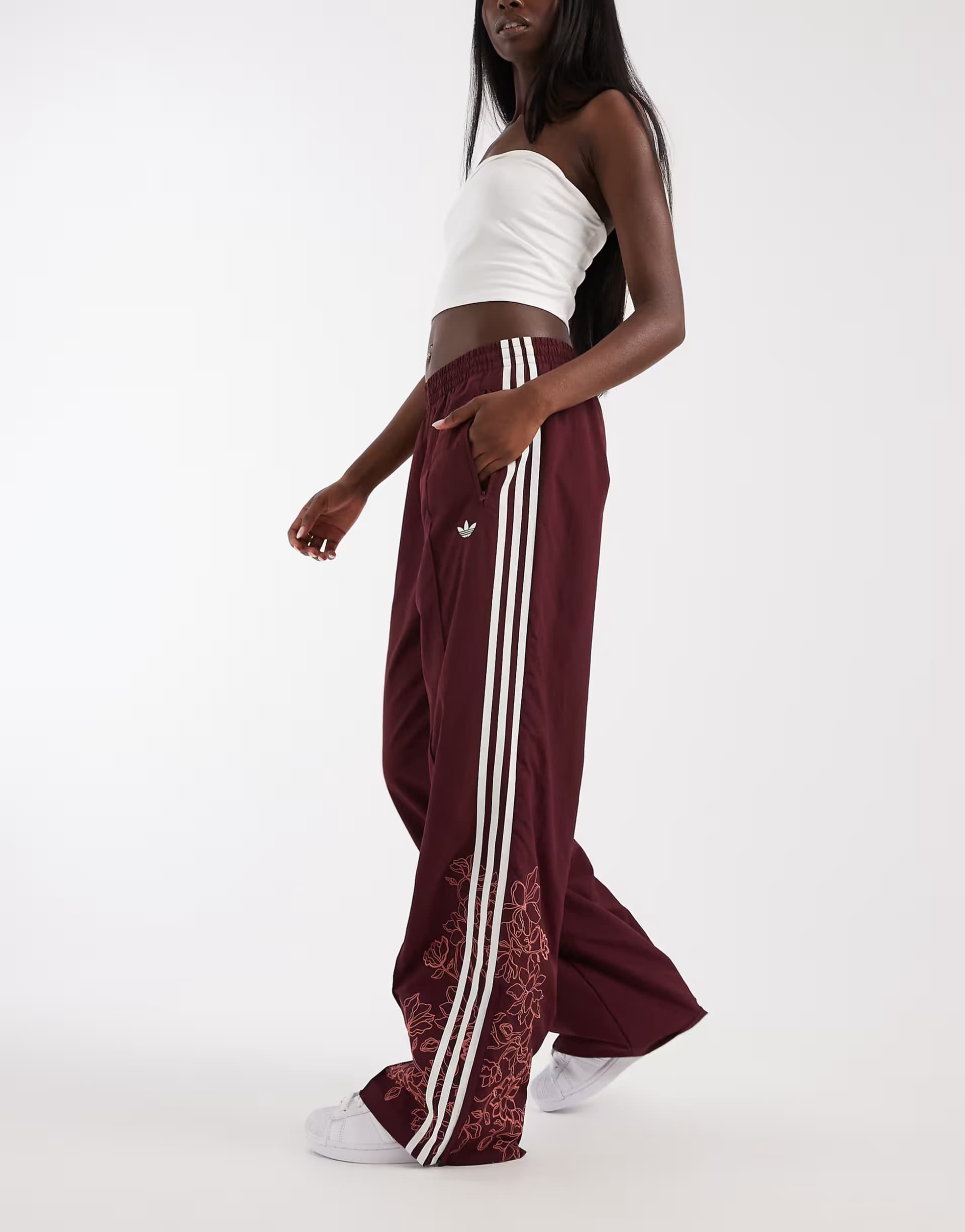 ASOS adidas Originals Firebird loose floral embroidered track pants in maroon