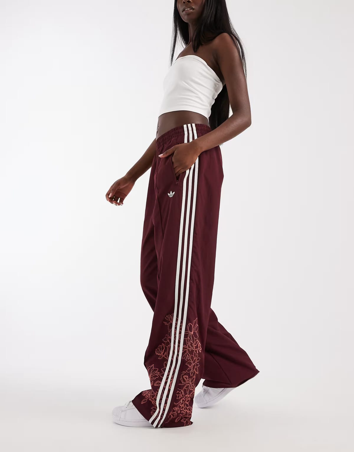 ASOS adidas Originals Firebird loose floral embroidered track pants in maroon - 1
