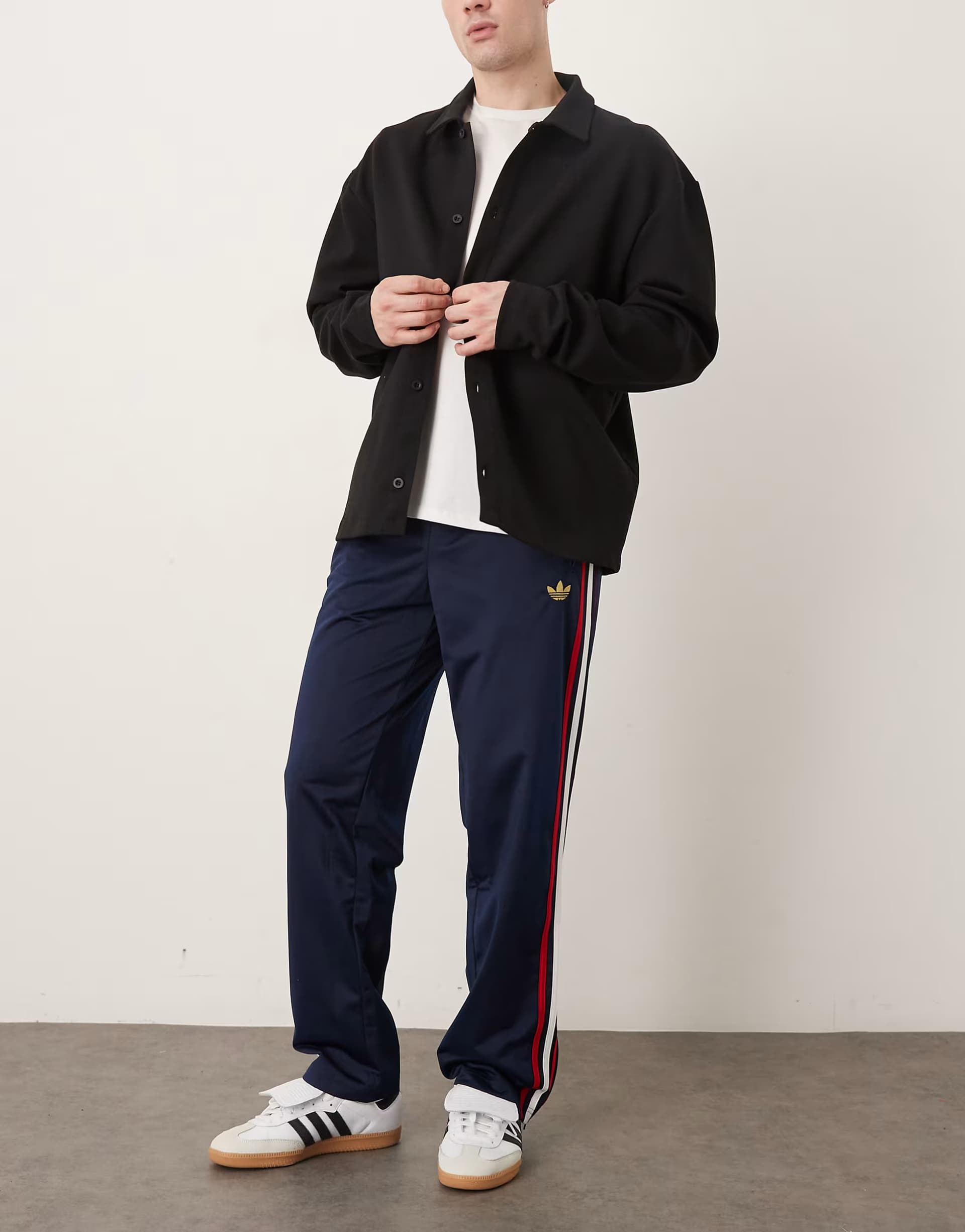ASOS adidas Originals Firebird track pants in navy and red