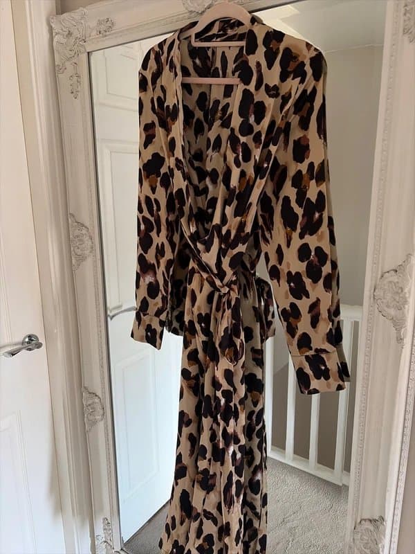 Never Fully Dressed Never fully dressed leopard dress