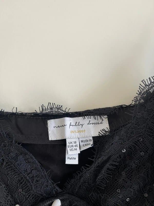 Never Fully Dressed Never Fully Dressed Mini black dress