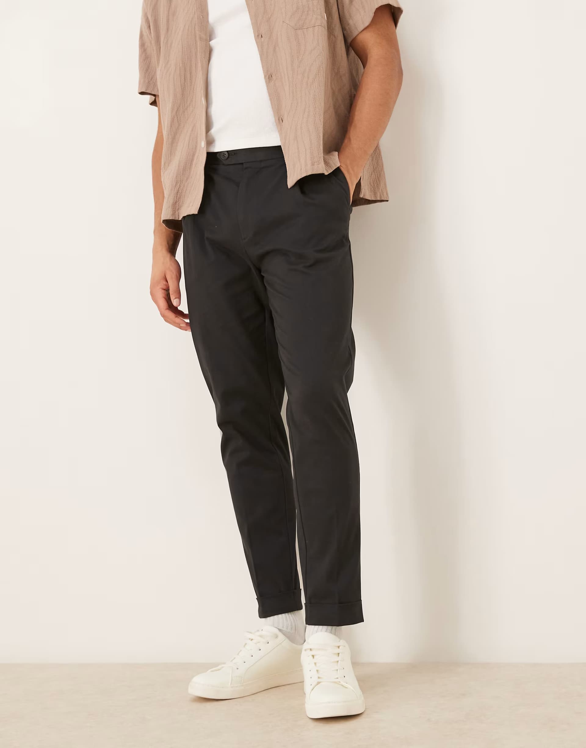 ASOS ASOS DESIGN smart cotton rich tapered chino trousers in black with turnup