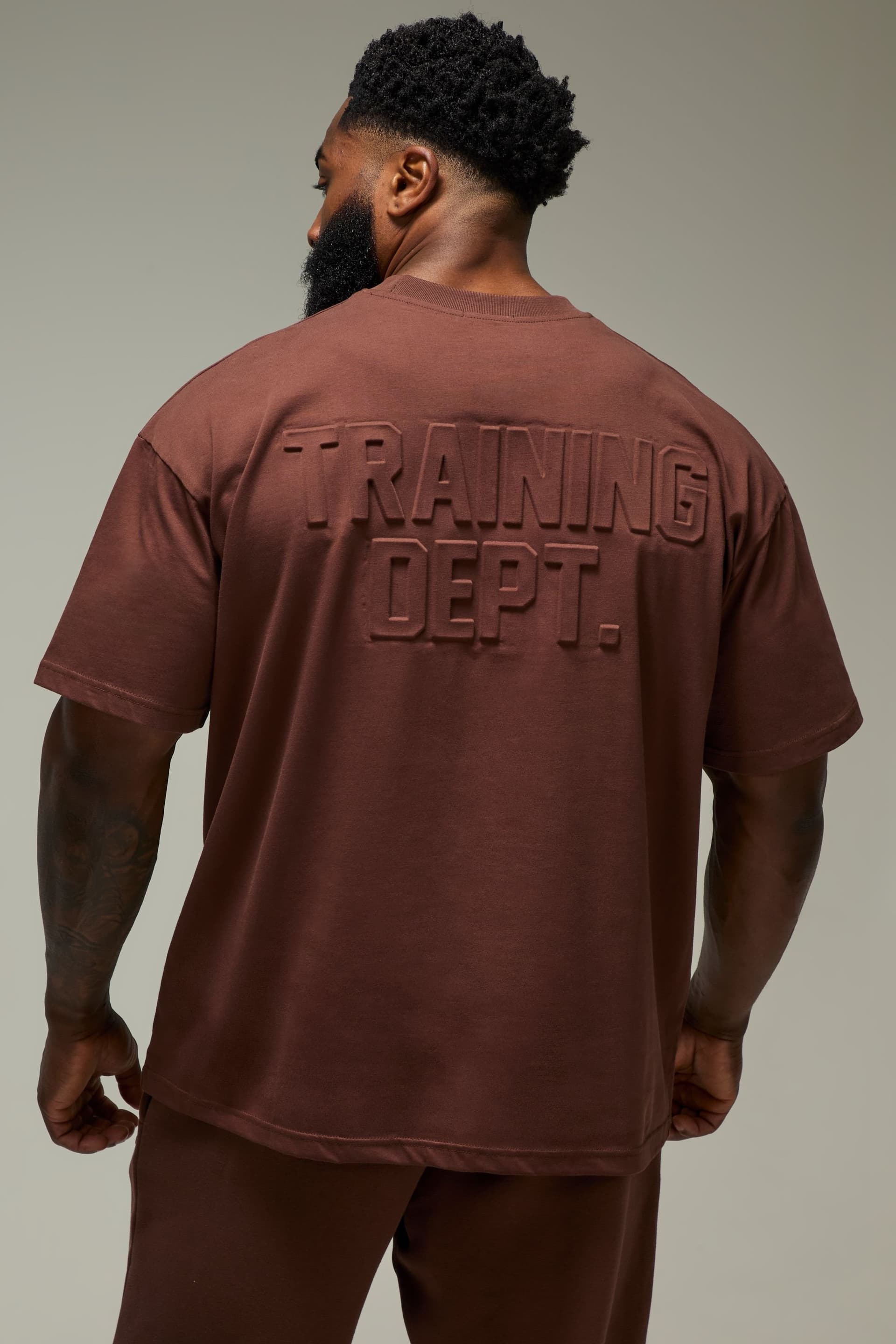 Training Dept. Training Dept. Men's Training Dept Embossed Oversized T-shirt in Chocolate