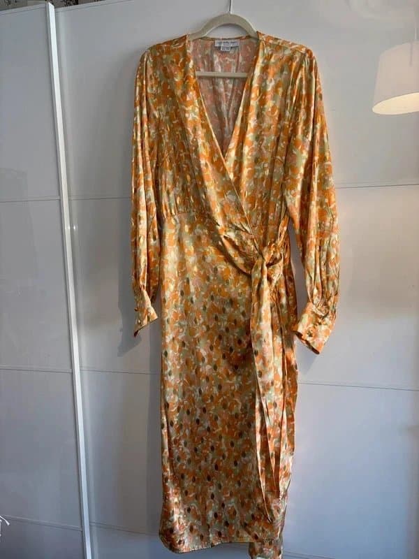 Never Fully Dressed Never fully dressed wrap dress
