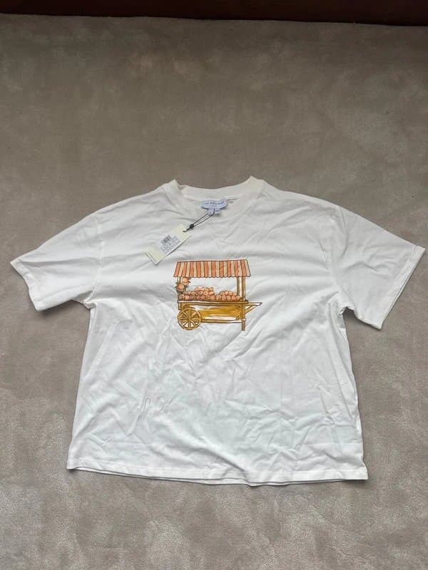 Never Fully Dressed Never fully dressed graphic T-shirt with orange