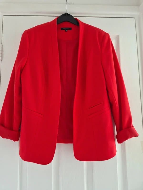New Look Brand New w/o tags collarlesss orange jacket from New Look. Size 12