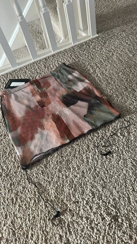 PrettyLittleThing PLT nude sheer mesh abstract print reverse detail mini skirt