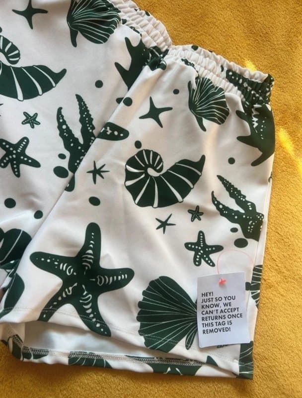 ASOS ASOS design shorts in green seashell print