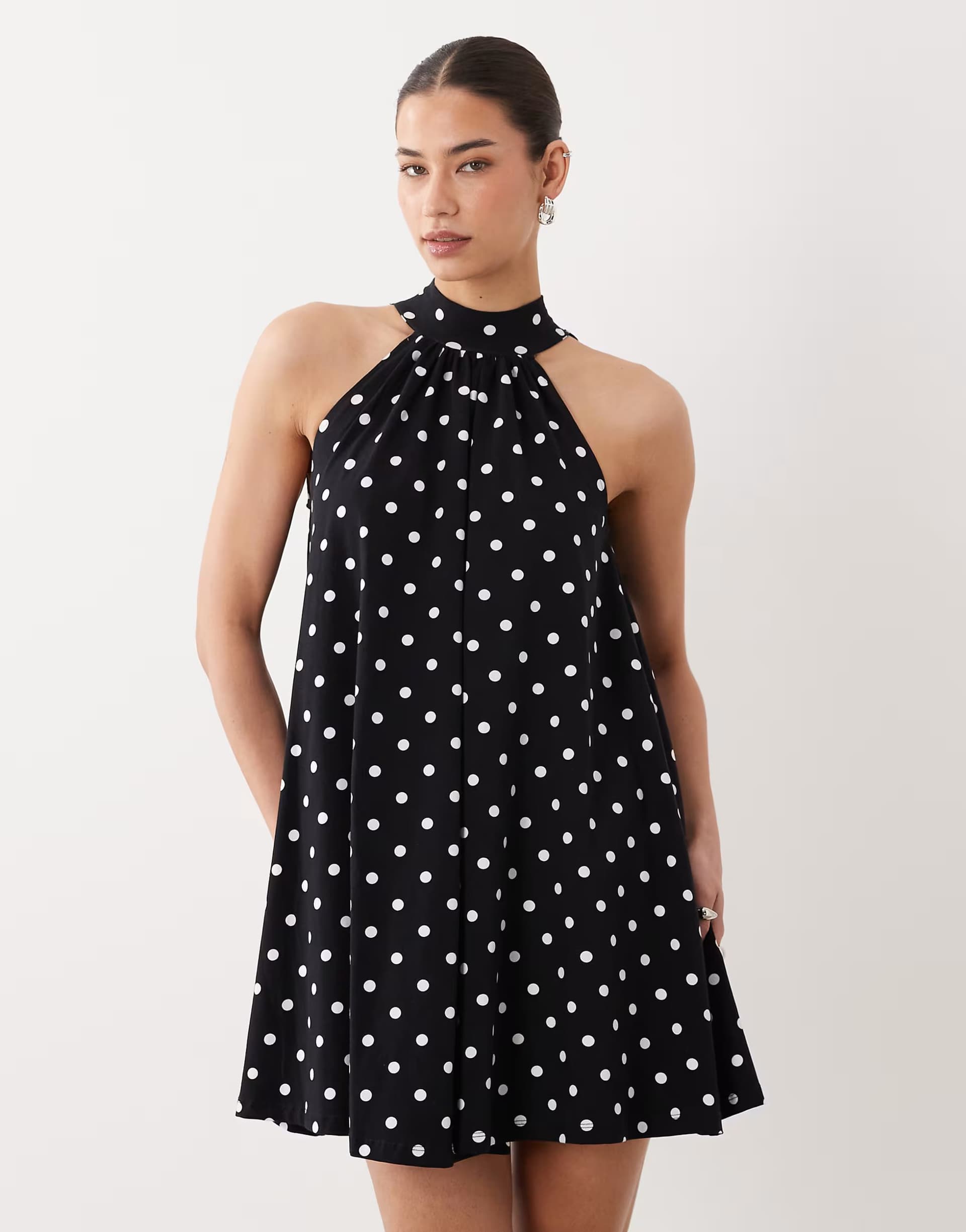 ASOS ASOS DESIGN polka dot mini with bow detail in spot
