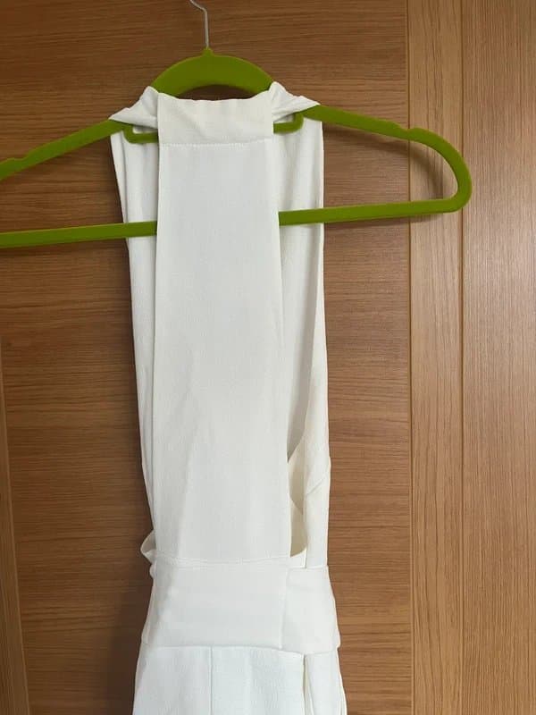 Never Fully Dressed Elegant white Never Fully Dressed Jumpsuit size 12
