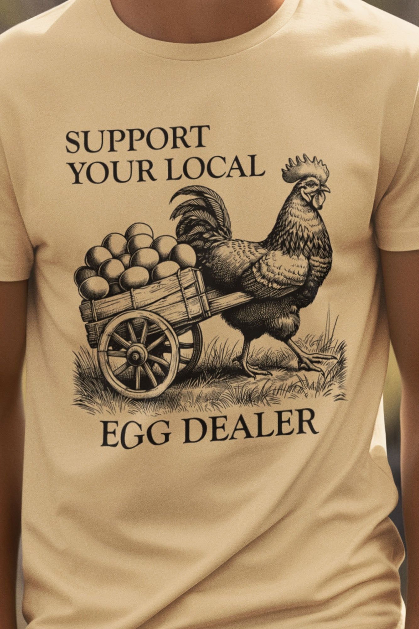 Bad Zebedee Bad Zebedee Men's Support Your Local Egg Dealer Chicken T-Shirt in Light Sand - 2