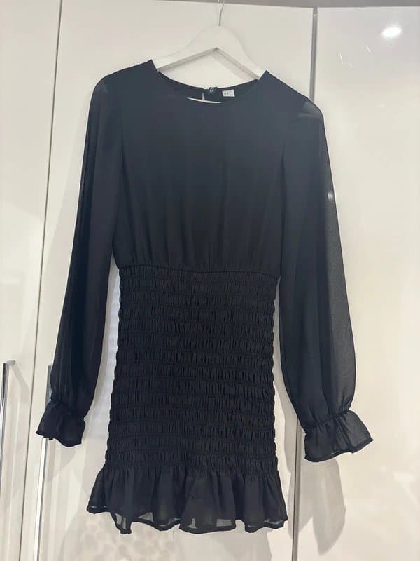 H&M black H&M smocked-detail dress with long sleeves and a ruffled hem