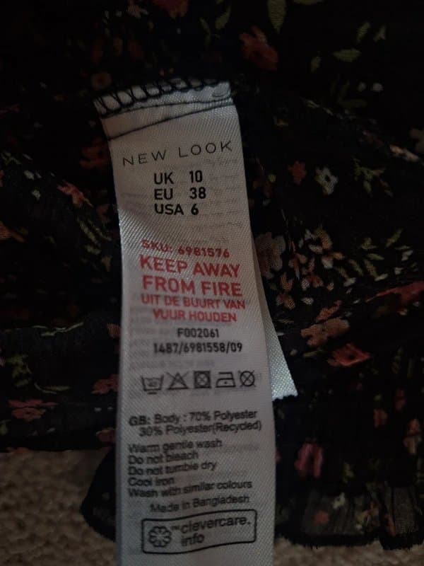 New Look Black chiffon style top with flower detail