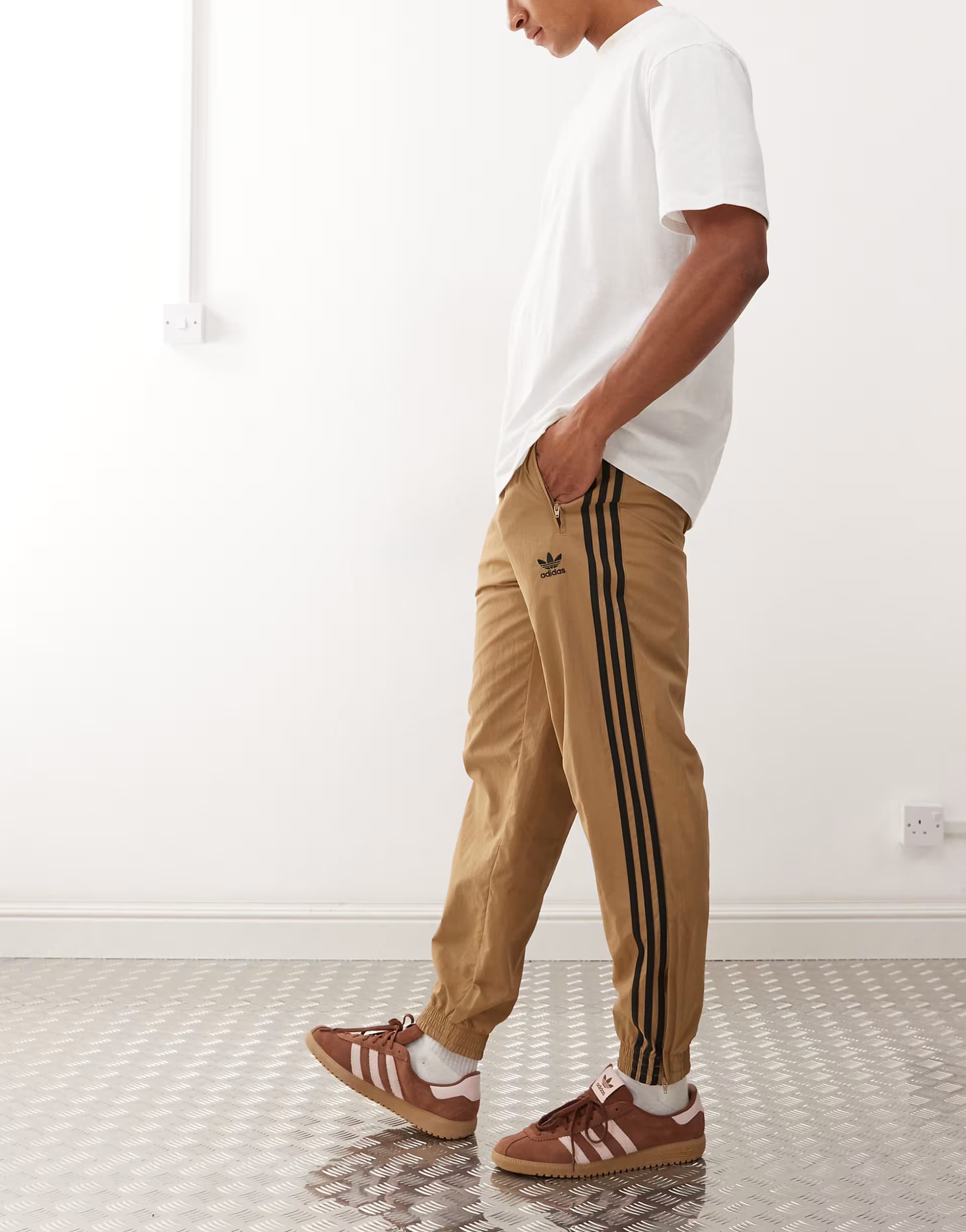 ASOS adidas Originals Firebird track pants in brown and black