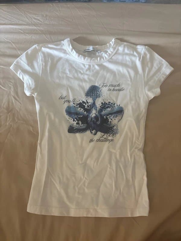 Bershka white baby tee with blue flower detail