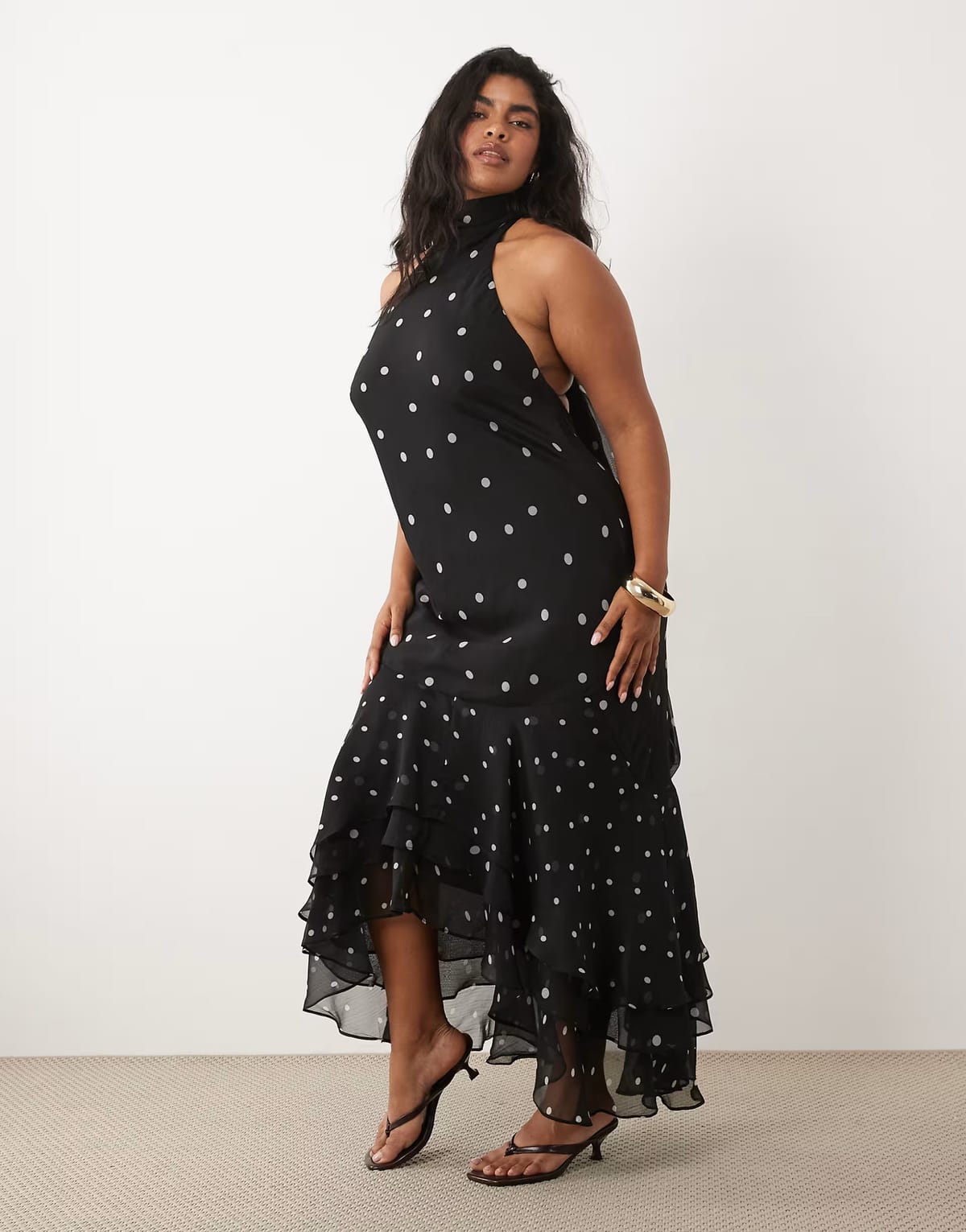 ASOS ASOS DESIGN Curve halter maxi dress with scarf detail and ruffle hem in mono spot - 1