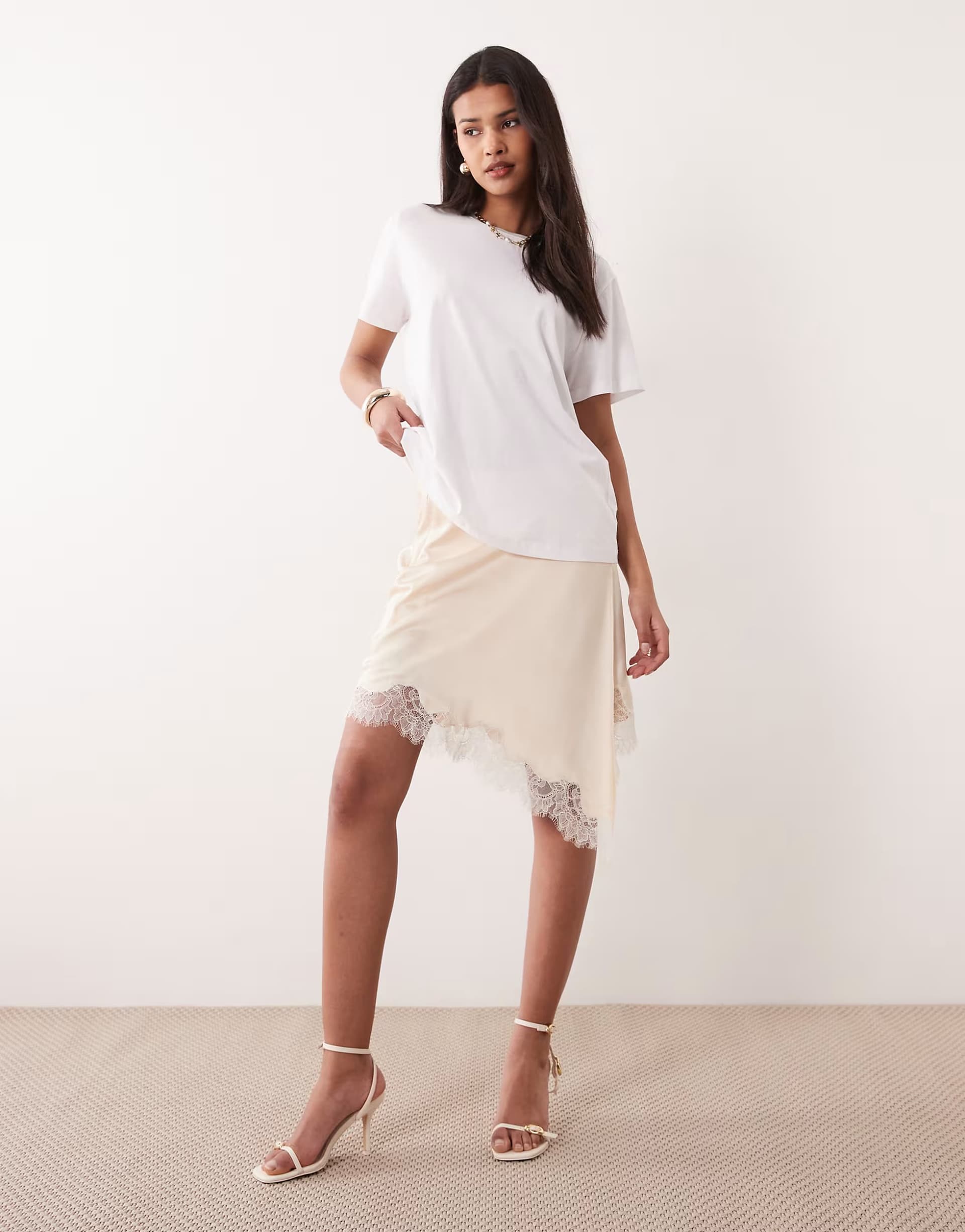 ASOS Mango asymmetric satin mini skirt with lace trim in pale pink