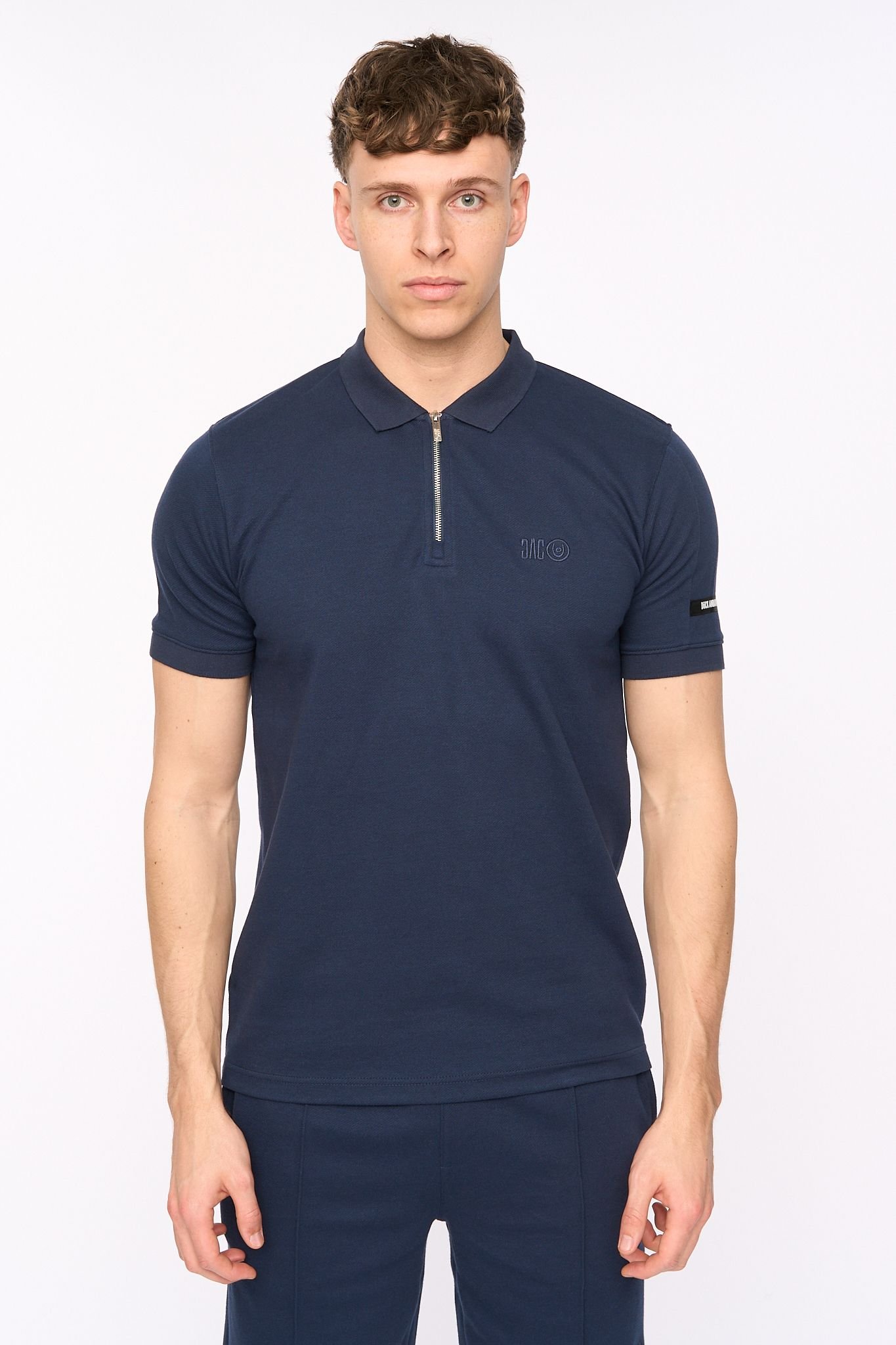 Duck and Cover Duck and Cover Men's Sherborn Smart Zip Polo with Sleeve Panels in Navy - 1