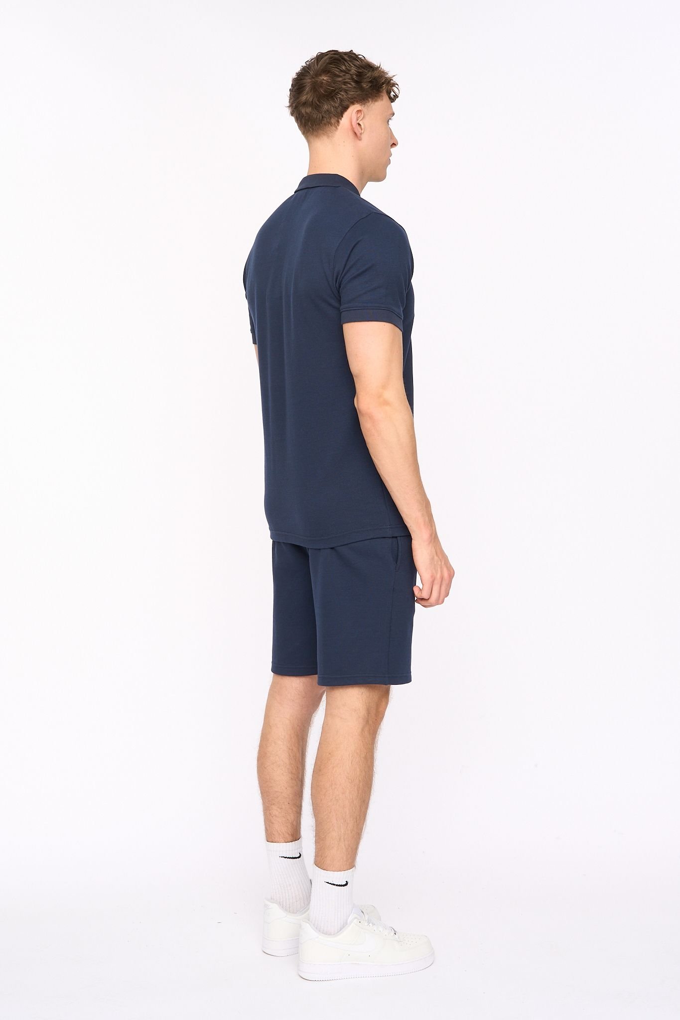 Duck and Cover Duck and Cover Men's Sherborn Smart Zip Polo with Sleeve Panels in Navy - 2