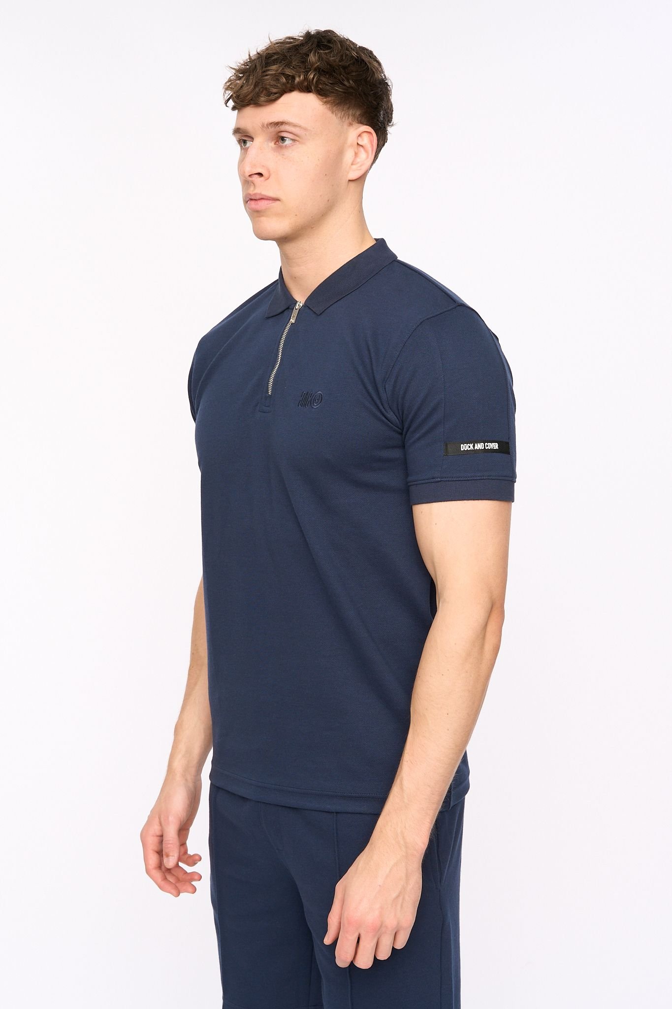 Duck and Cover Duck and Cover Men's Sherborn Smart Zip Polo with Sleeve Panels in Navy - 3