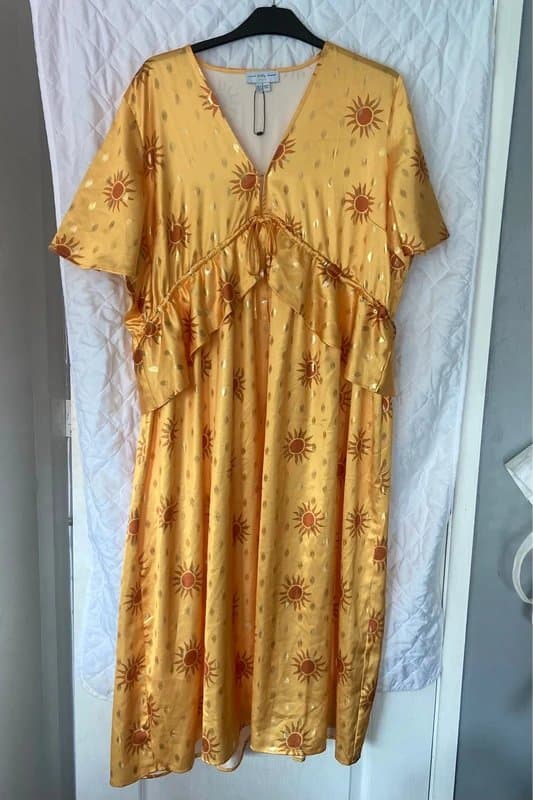 Never Fully Dressed Beautiful wedding guest dress