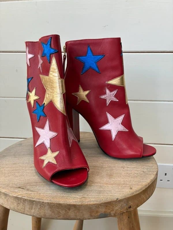 Tommy Hilfiger A funky pair of red leather peep toe ankle boots with metallic stars by Tommy Hilfiger size 3